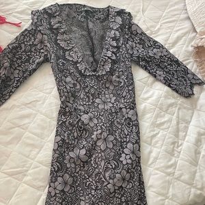 For love and lemons black and gray lace. Mid sleeve with open back. Worn once.